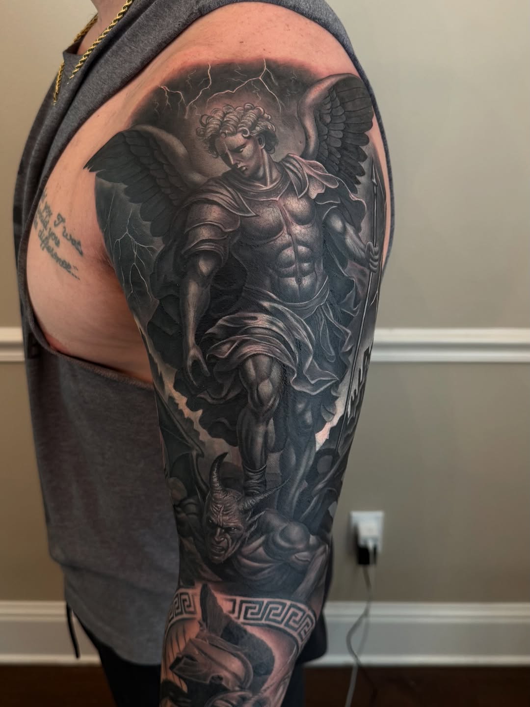 Tattoo by @angels__tattoo — realism, black_and_grey