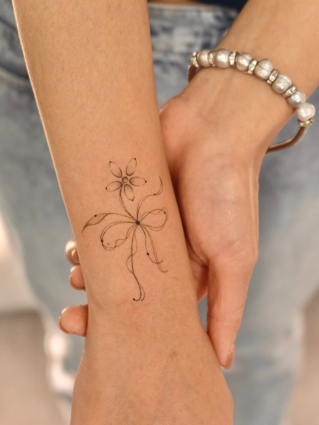 Tattoo by @starofdreams.tatt — fine_line, minimalist