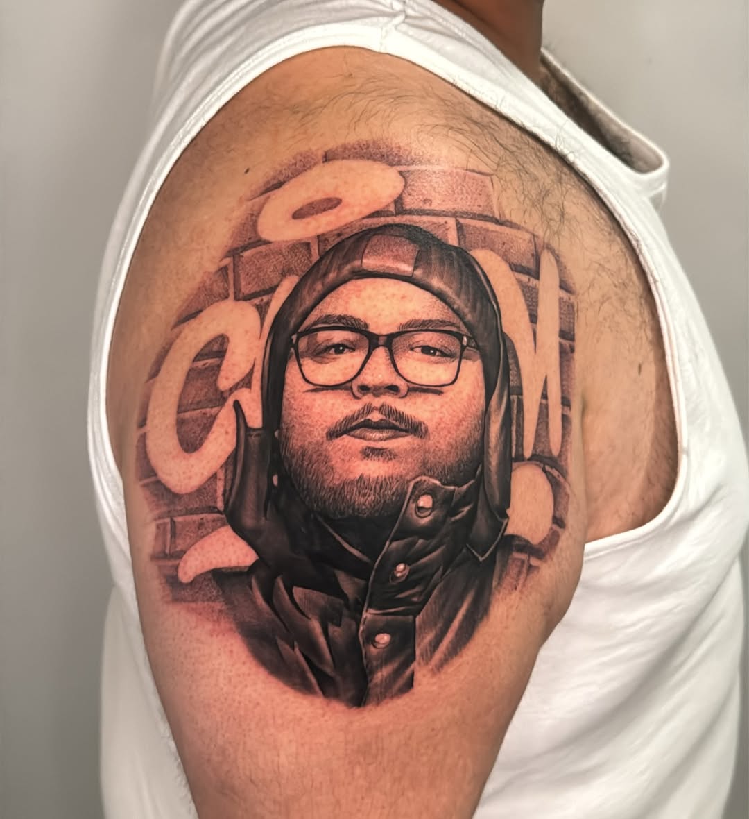 Tattoo by @manzur_no.name — realism, black_and_grey