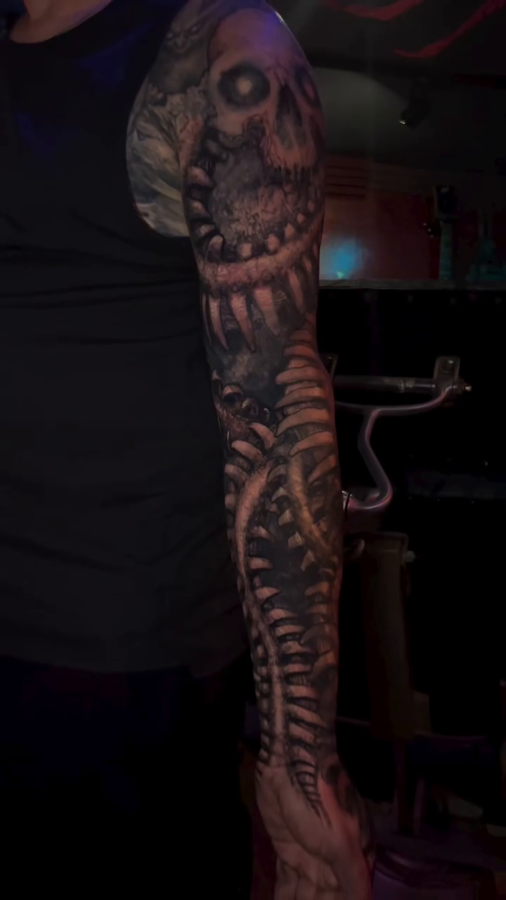 Tattoo by @paulbooth — dark_realism, black_and_grey