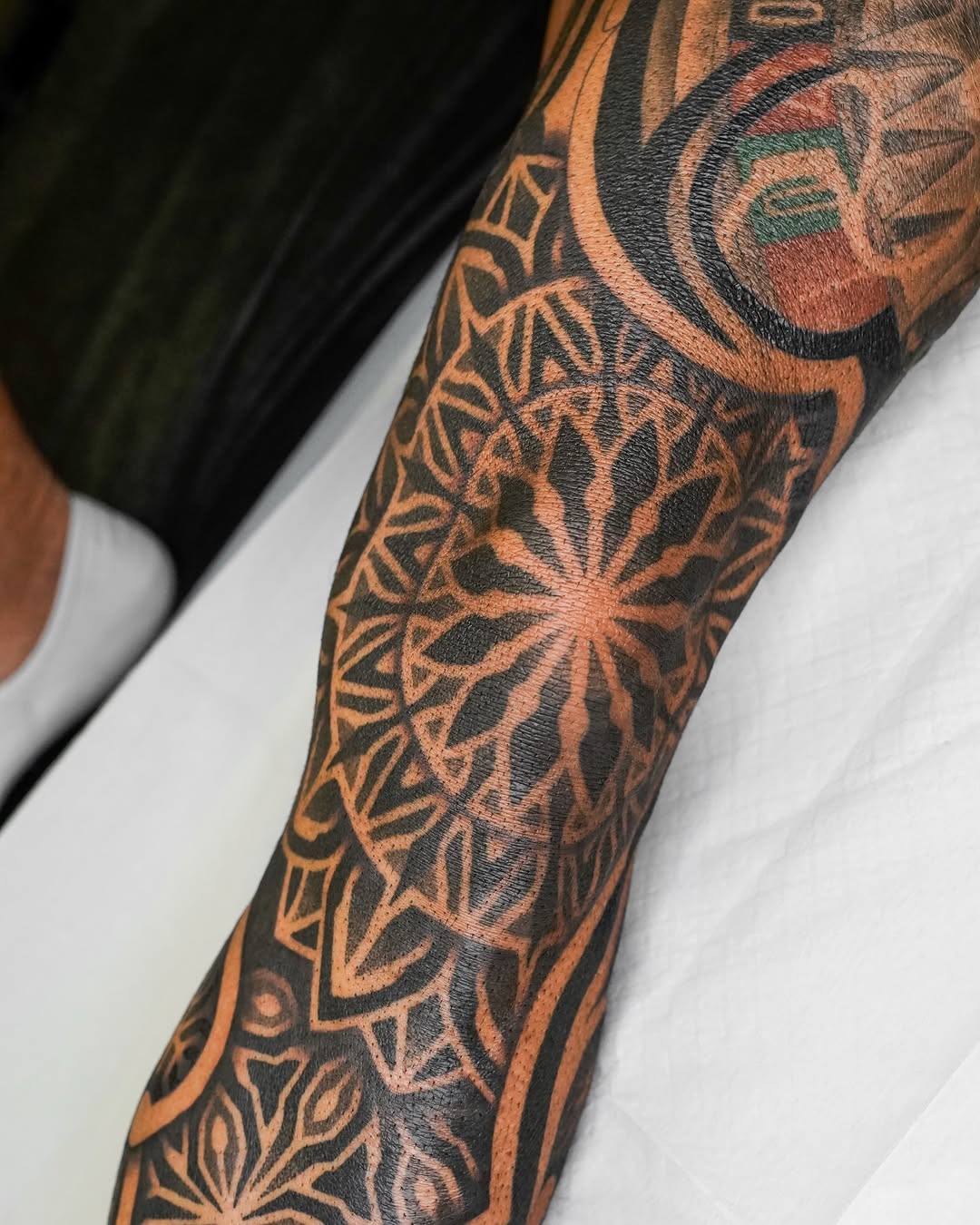 Tattoo by @rjxdots — geometric, blackwork