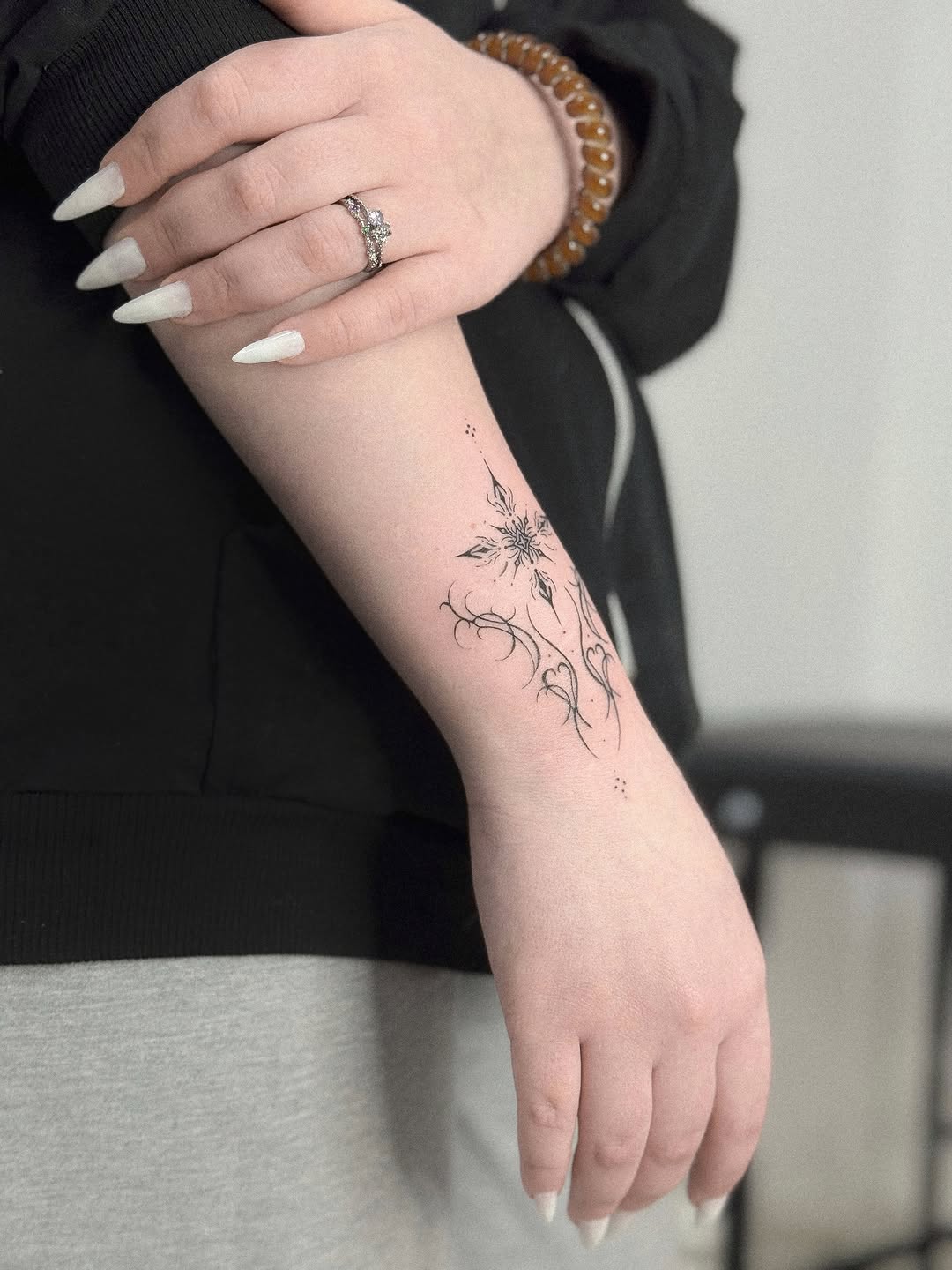 Tattoo by @romanova.skinart — fine_line, ornamental