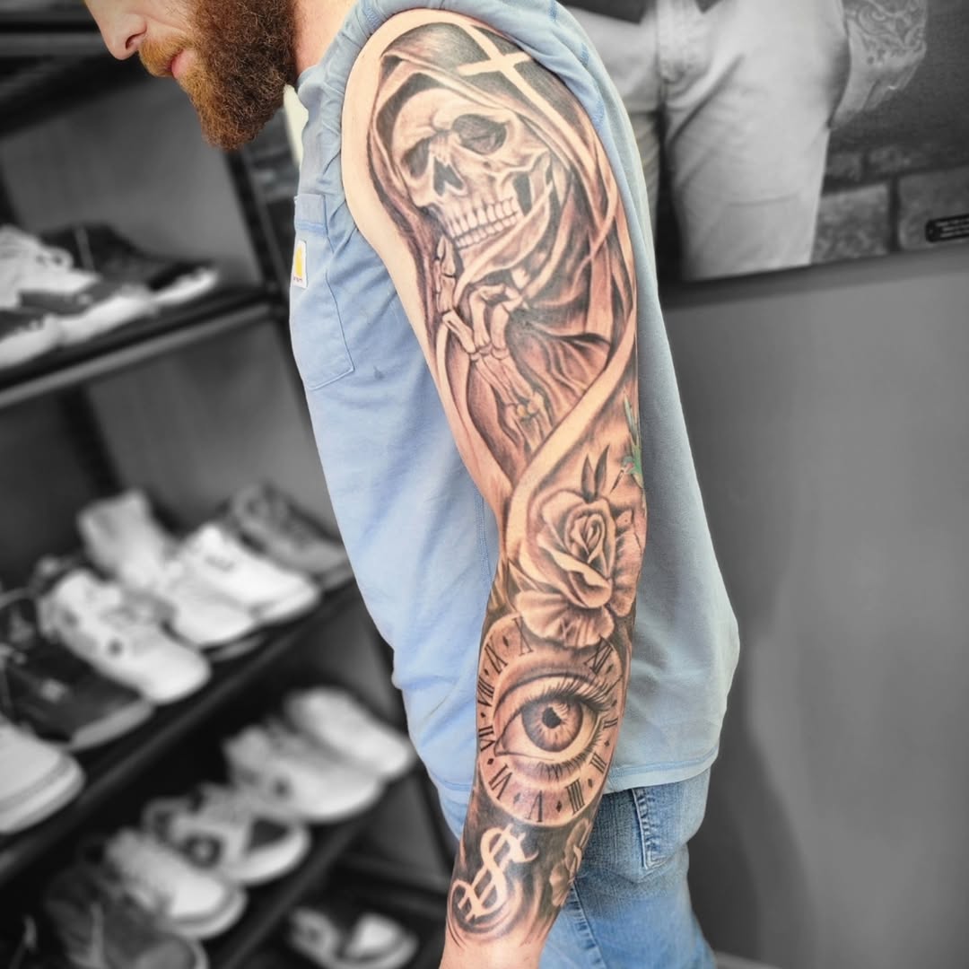 Tattoo by @tattoodennis76 — black_and_grey, realism