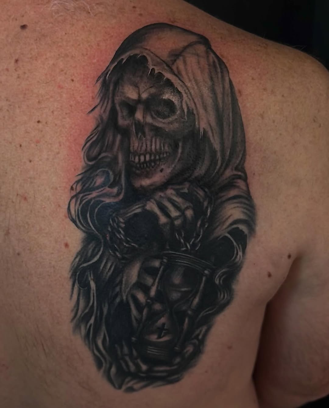 Tattoo by @7th_heaven_tattoo — dark_realism, black_and_grey