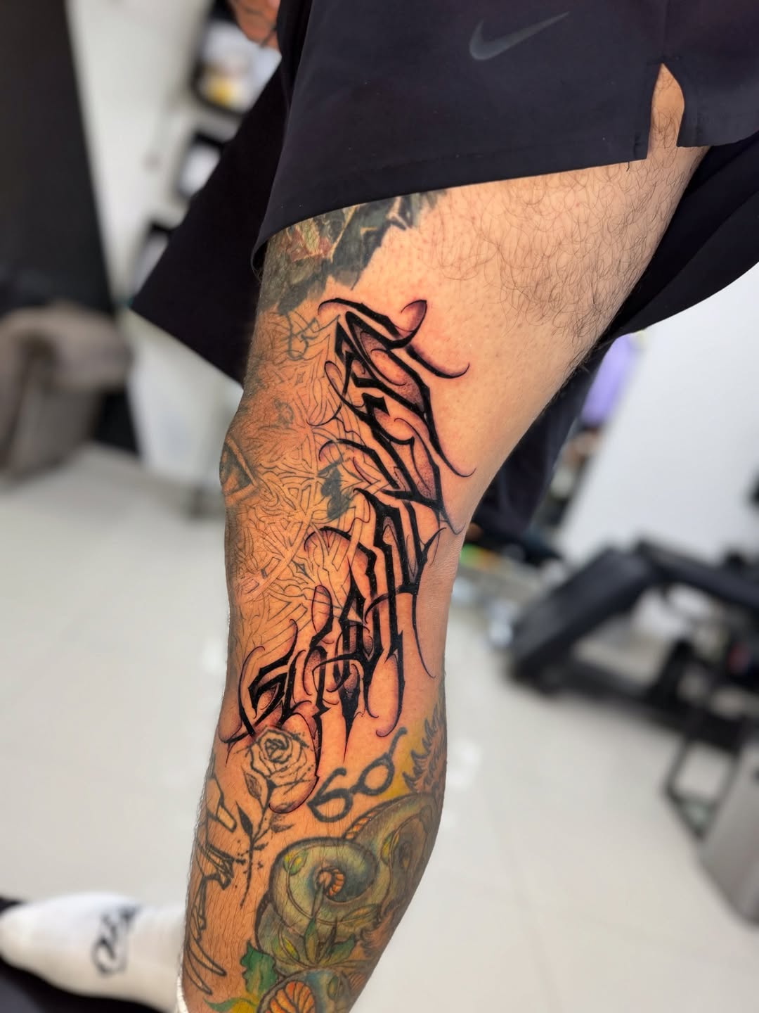 Tattoo by @toretattoo_311 — lettering_script, blackwork