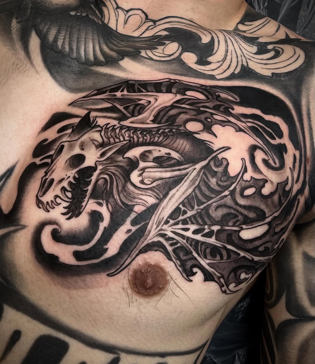Tattoo by @izztat2 — black_and_grey, dark_realism