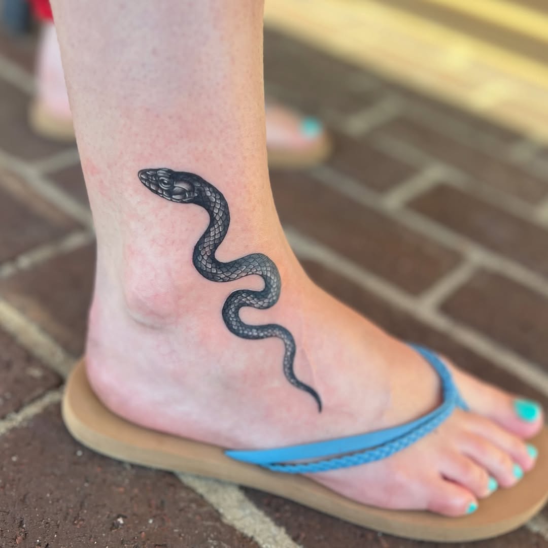 Tattoo by @jaiwoods_tattoo — realism, black_and_grey