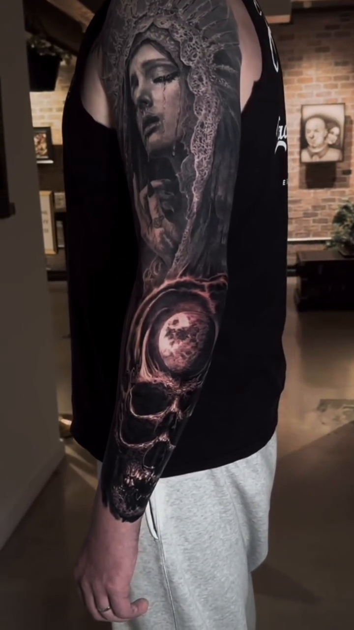 Tattoo by @zach.the.ripperr — dark_realism, black_and_grey