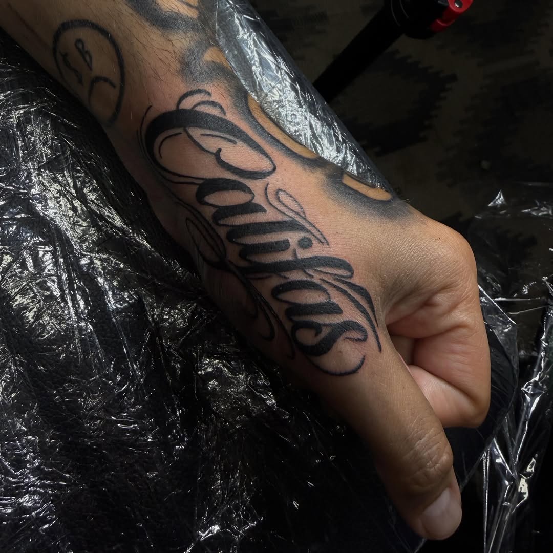 Tattoo by @offdosage.tats โ lettering_script, chicano