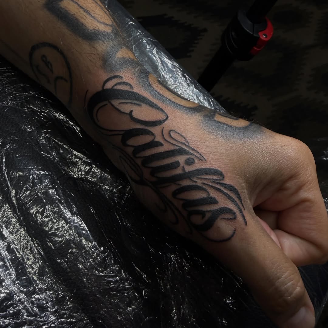Tattoo by @offdosage.tats โ lettering_script, chicano