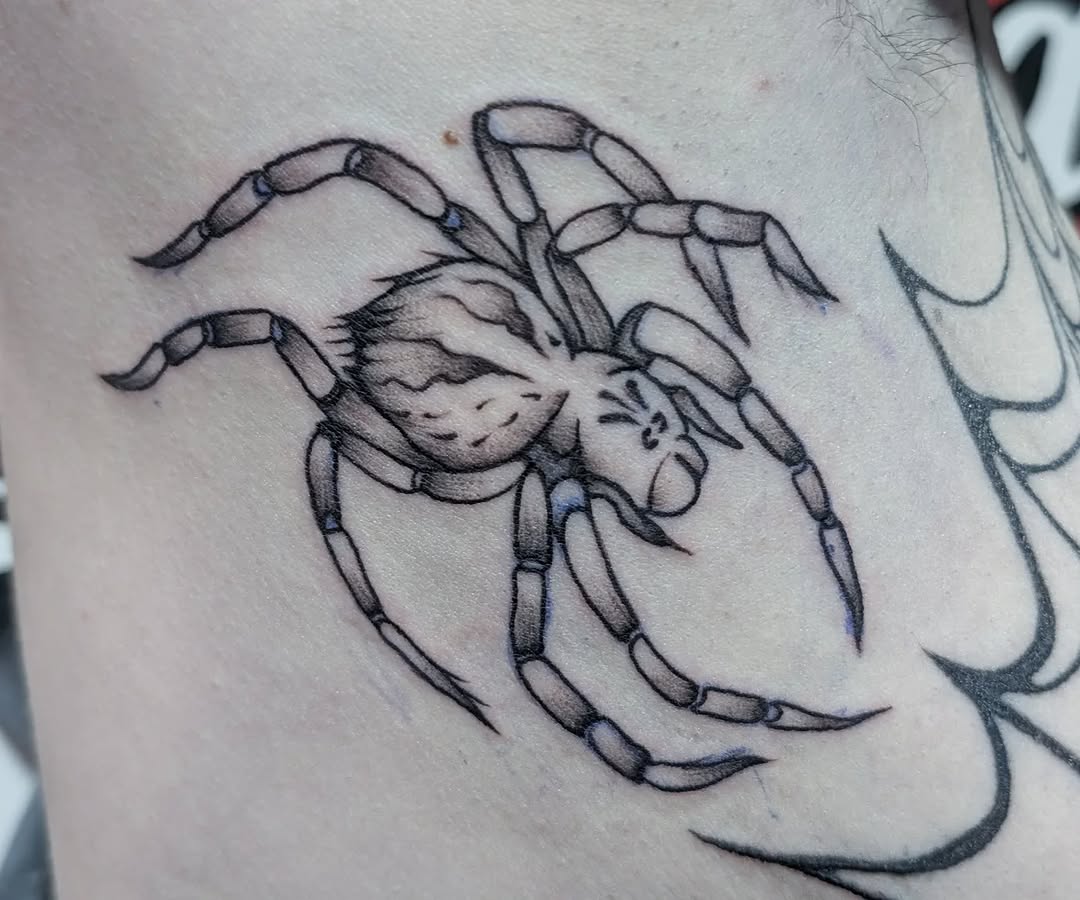 Tattoo by @poked.protein — black_and_grey, realism