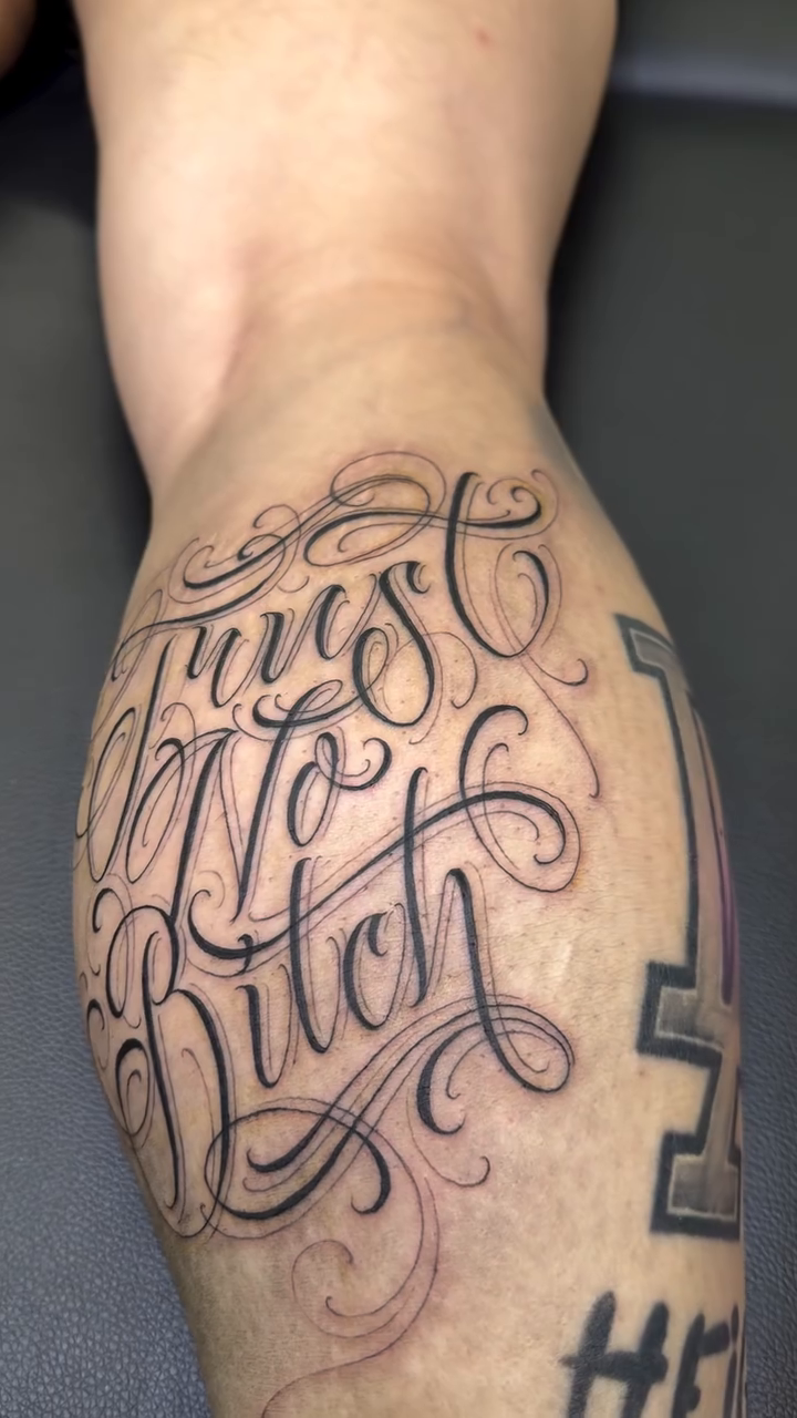 Tattoo by @scriptinator — lettering_script, black_and_grey