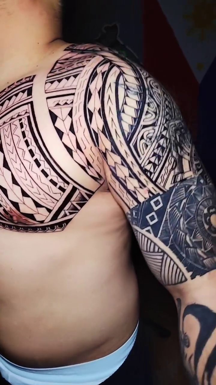 Tattoo by @therealmoneybagink — tribal, blackwork