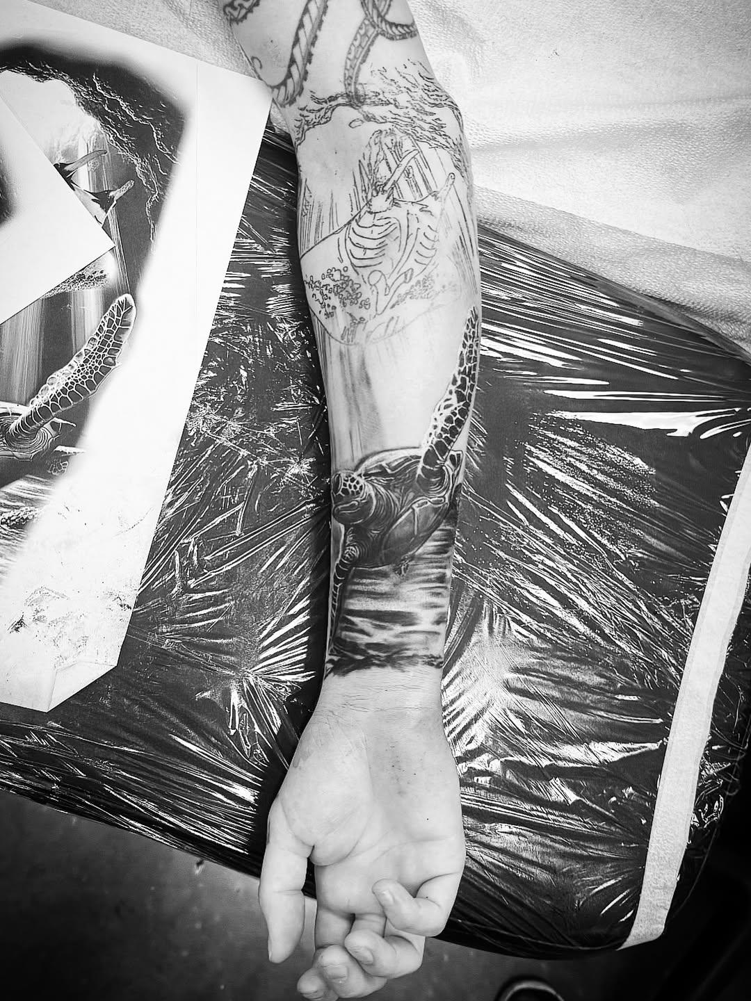 Tattoo by @archangel_artistry — realism, black_and_grey