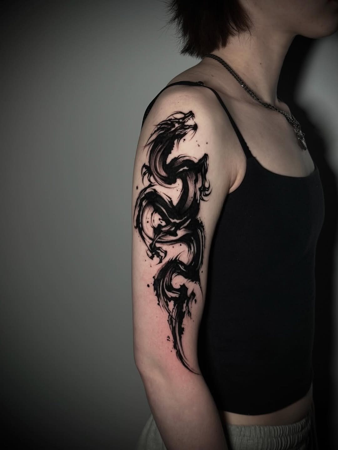 Tattoo by @kbtattz — illustrative, blackwork