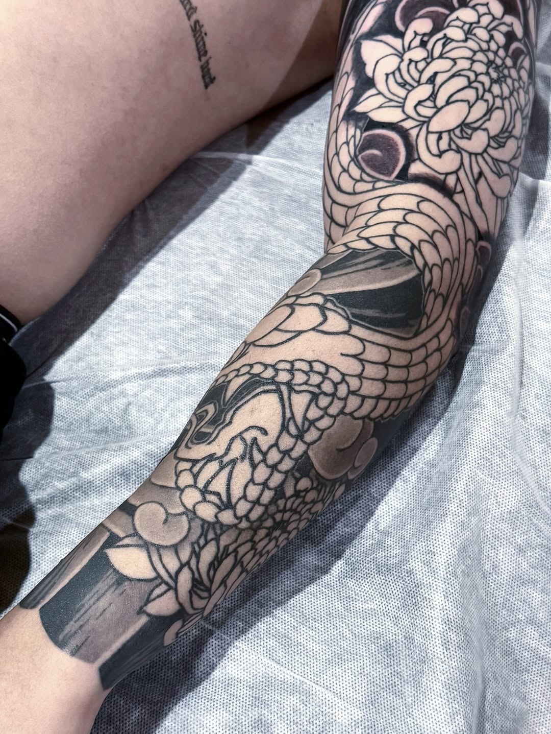 Tattoo by @noir_by_jm — japanese_irezumi, black_and_grey