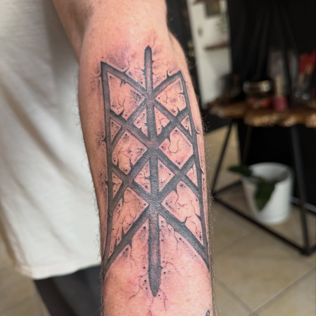 Tattoo by @etzeltattoo — geometric, blackwork