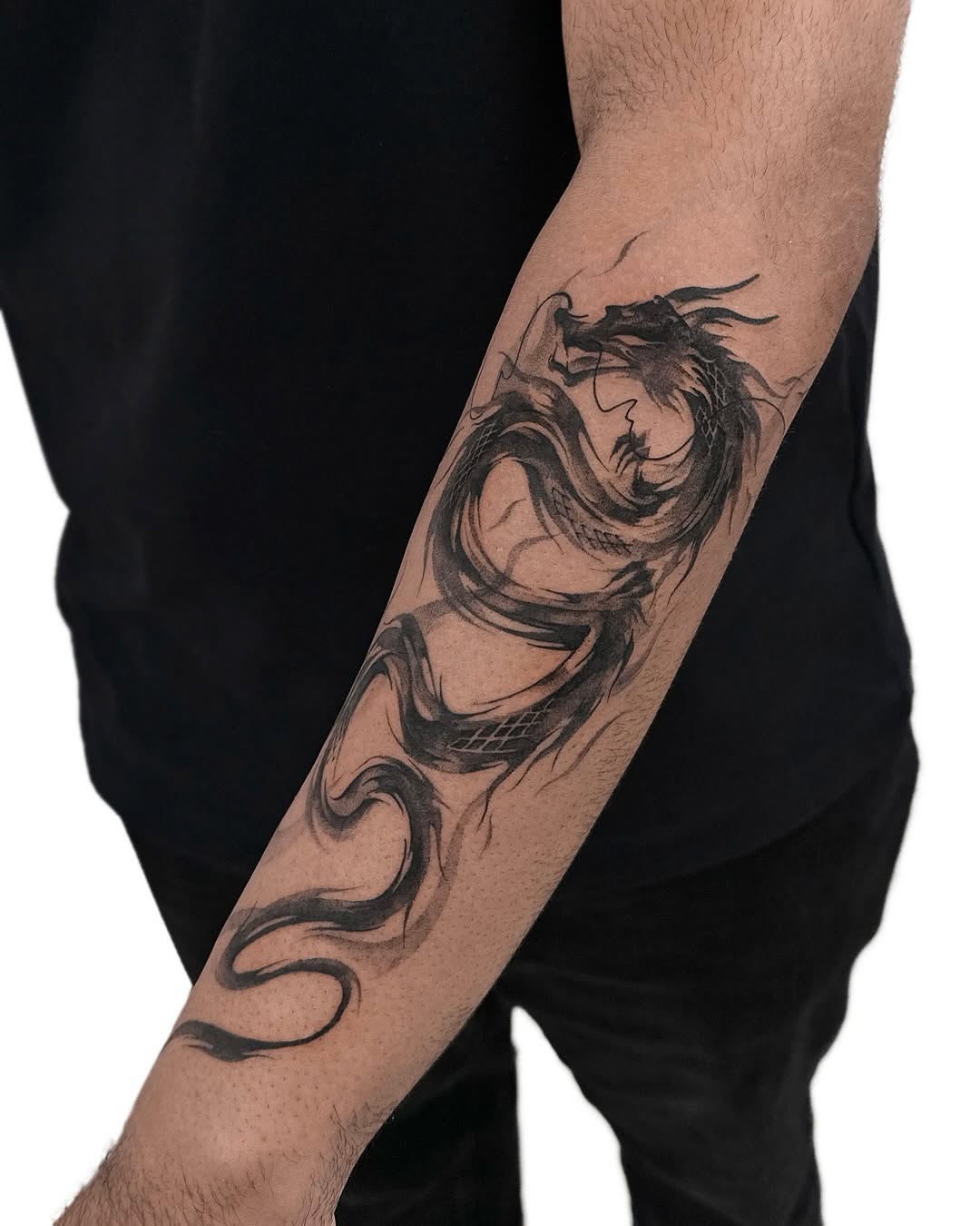 Tattoo by @uzo.ink — black_and_grey, illustrative