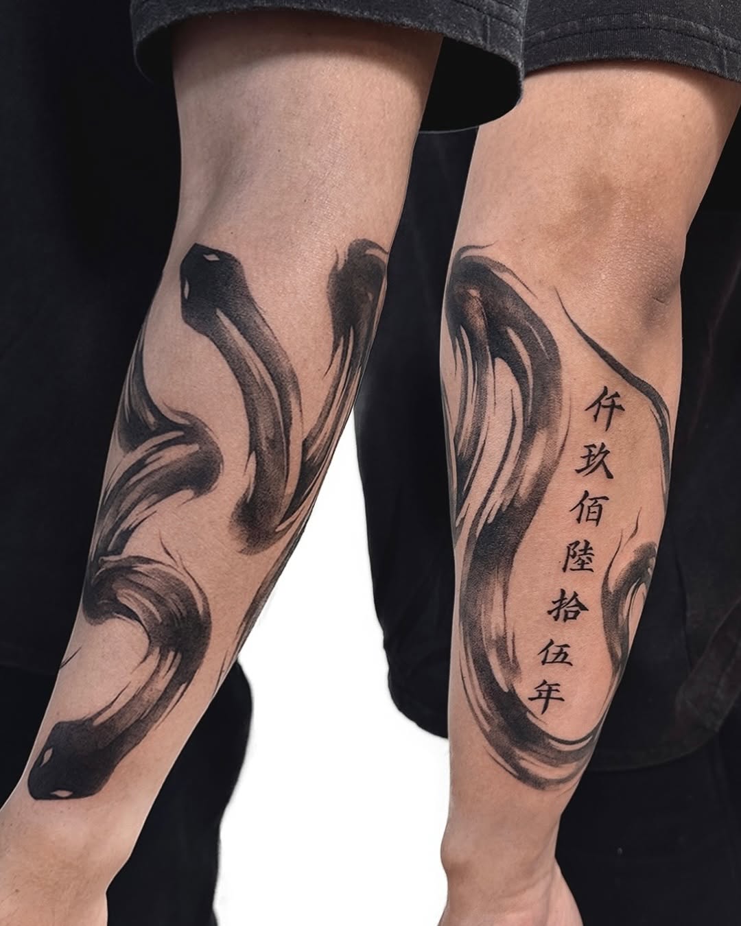 Tattoo by @uzo.ink — blackwork, lettering_script