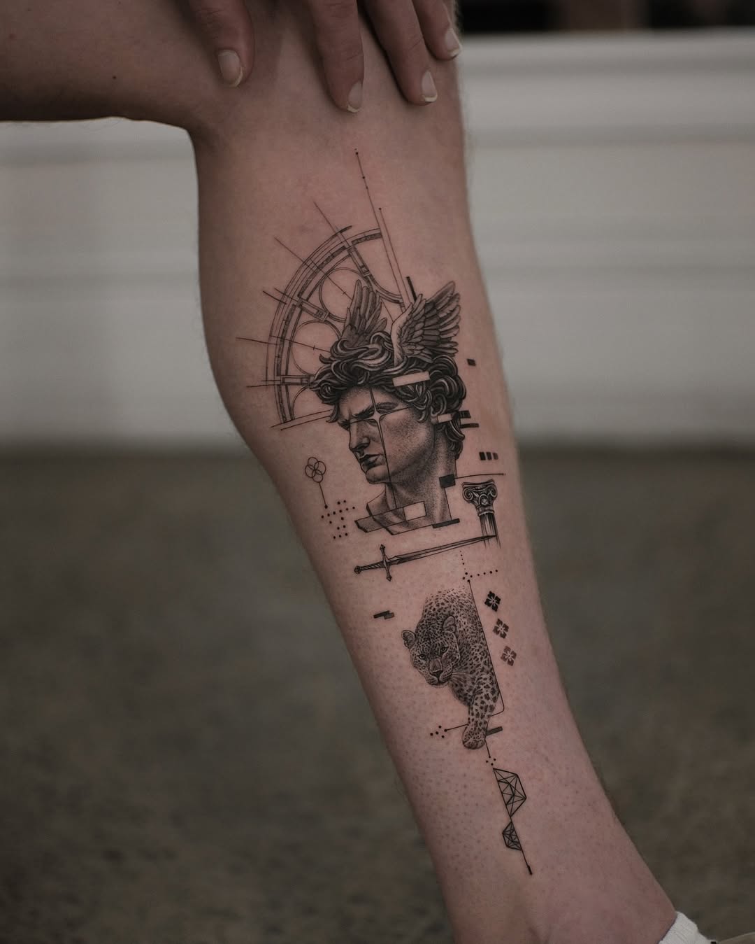 Tattoo by @zeke.tattoo — black_and_grey, geometric