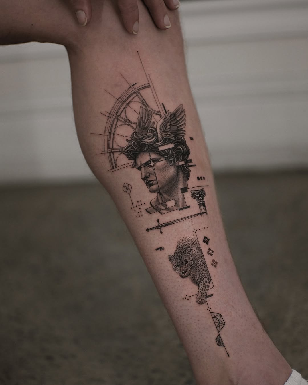 Tattoo by @zeke.tattoo — realism, geometric