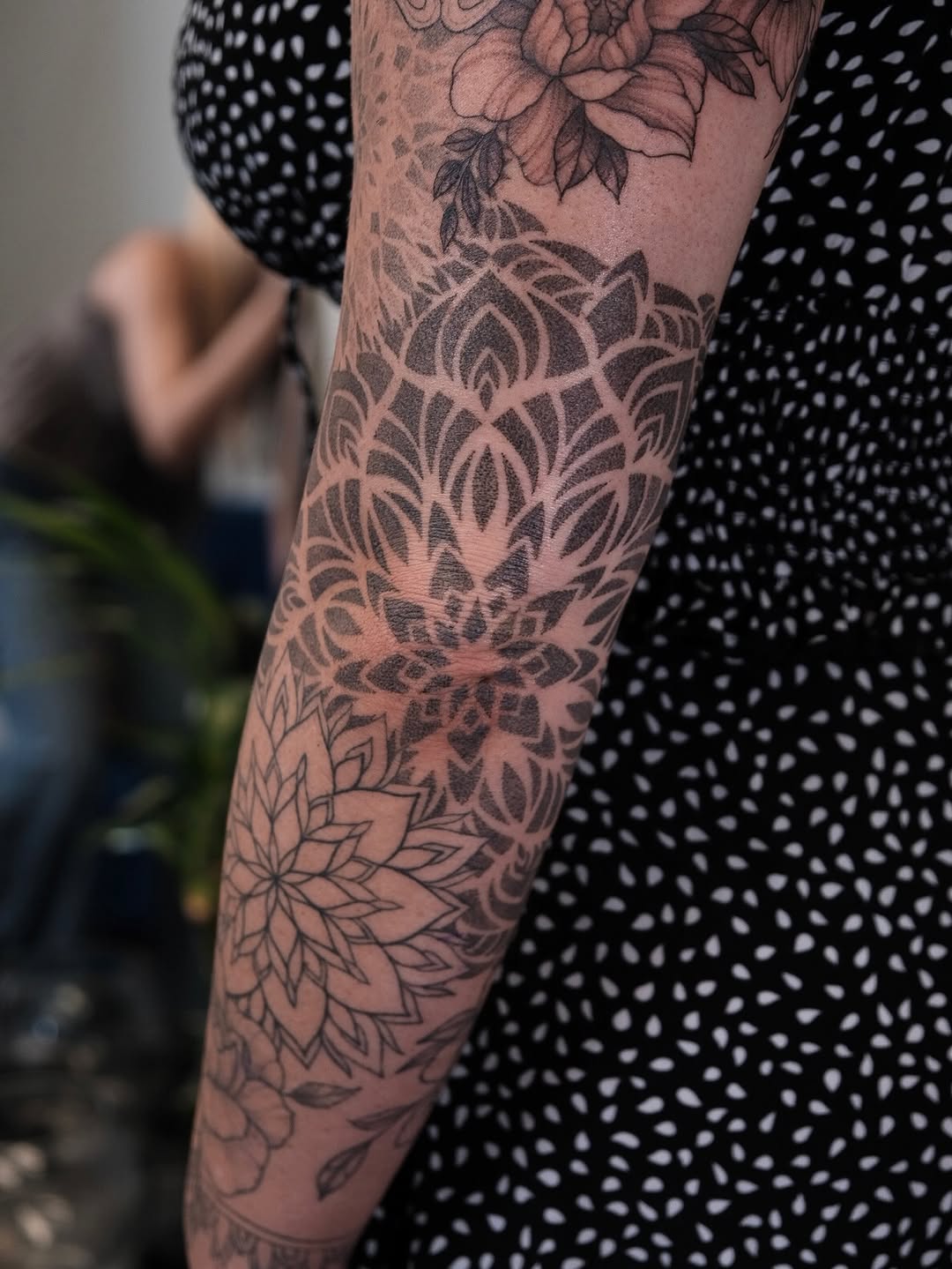 Tattoo by @ariana_tattooing — geometric, dotwork