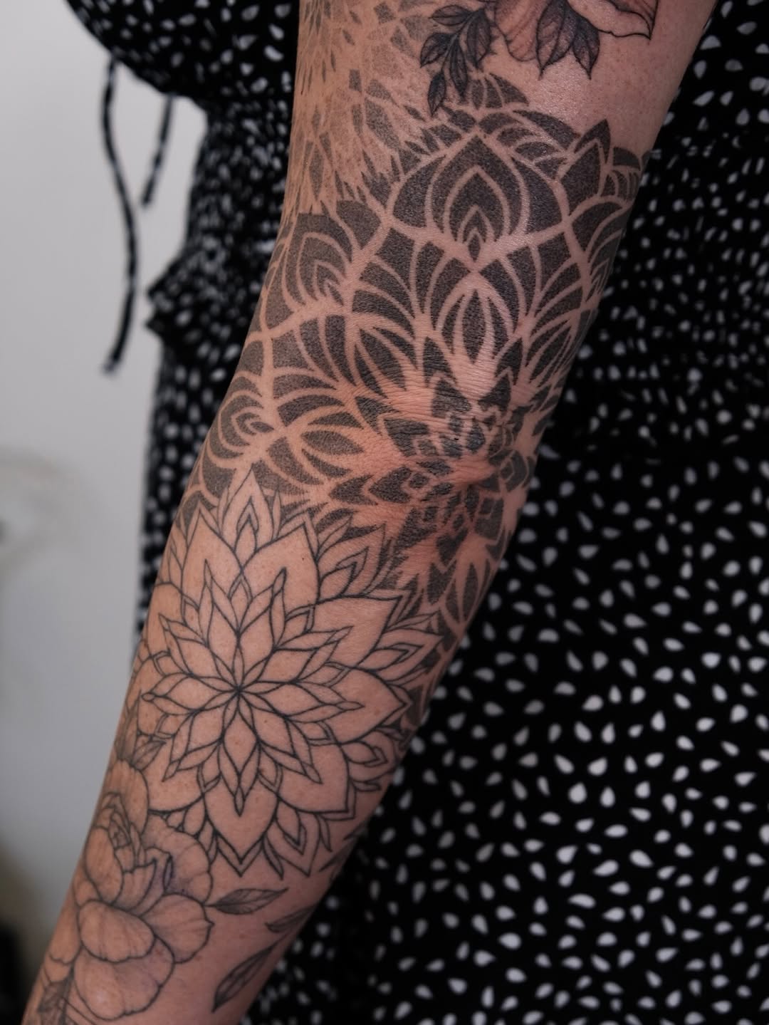 Tattoo by @ariana_tattooing — geometric, dotwork