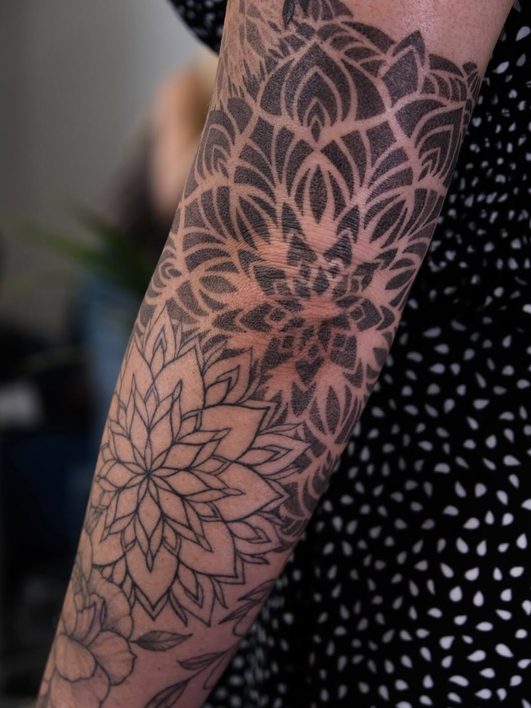 Tattoo by @ariana_tattooing — geometric, dotwork