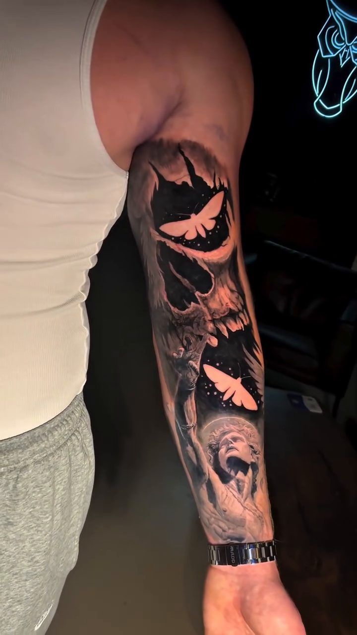 Tattoo by @chrislawtattoos — dark_realism, black_and_grey