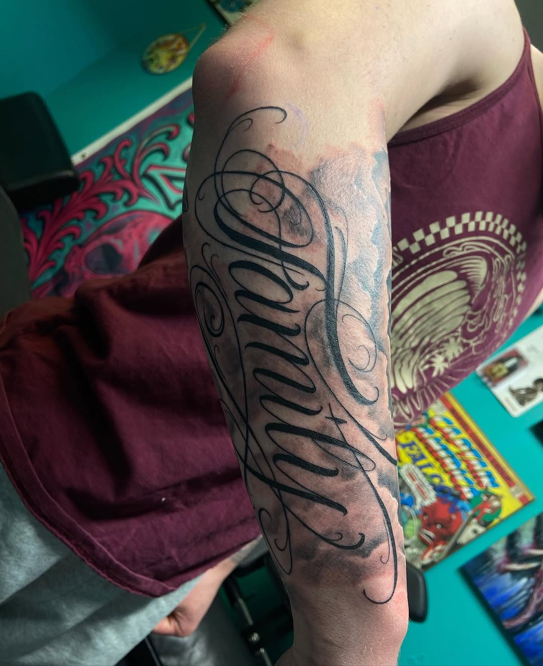 Tattoo by @tatts.by.zack — lettering_script, black_and_grey