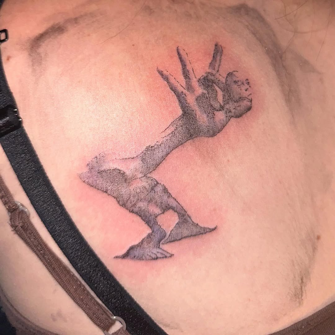 Tattoo by @skullyskinstitch — illustrative