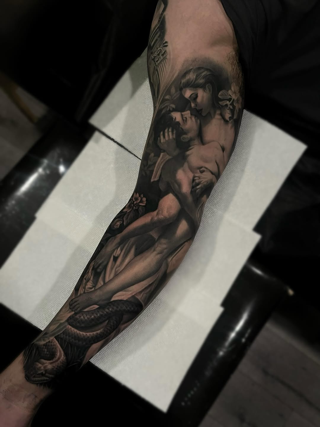Tattoo by @4biddenfruit.tattoo โ realism, black_and_grey