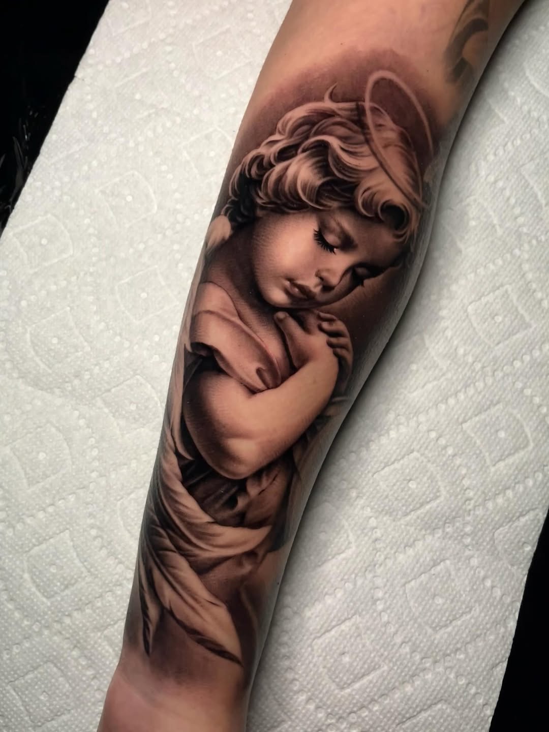 Tattoo by @4biddenfruit.tattoo โ realism, black_and_grey