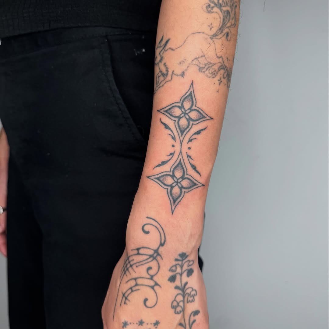 Tattoo by @microwave.00 — dotwork, ornamental