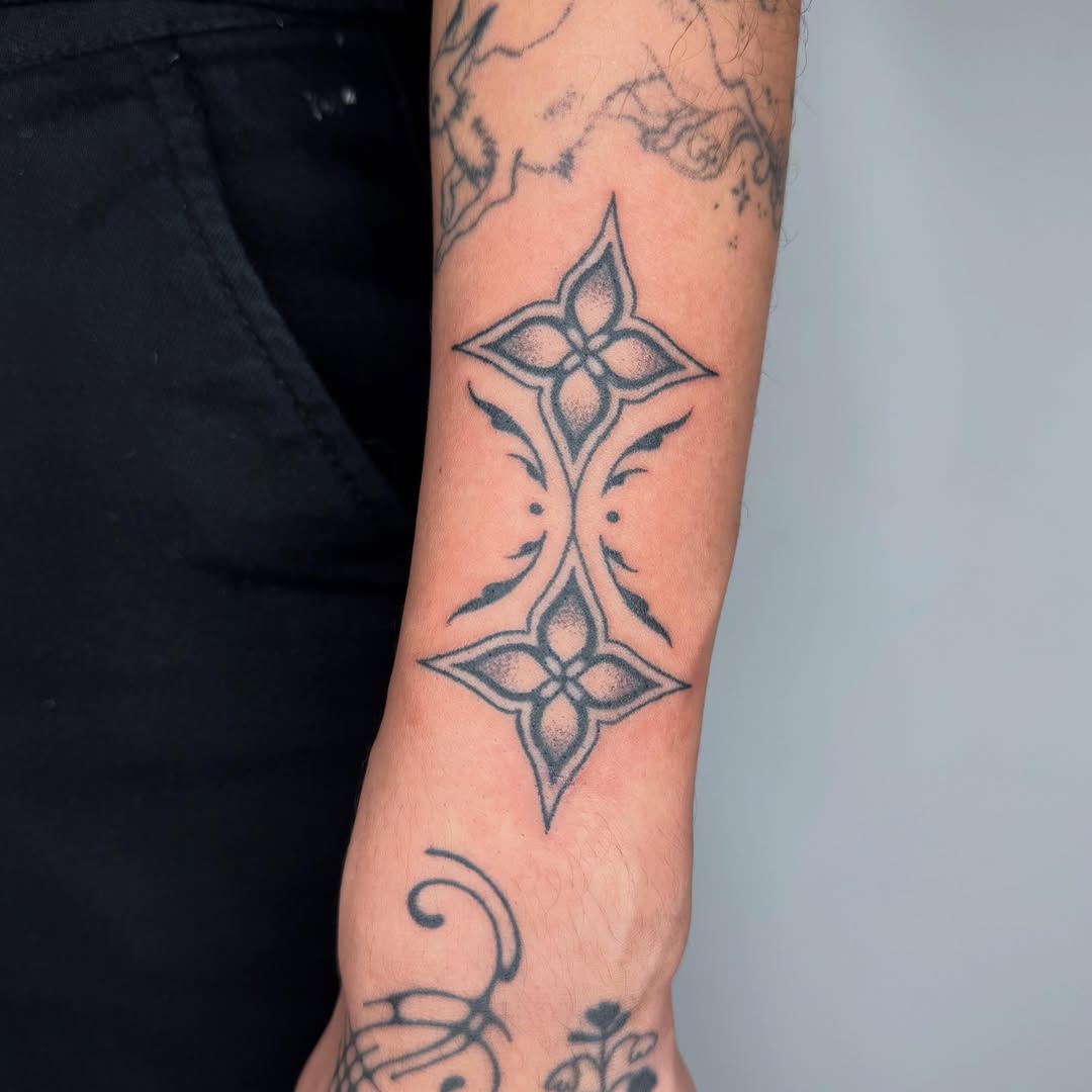 Tattoo by @microwave.00 — ornamental, dotwork
