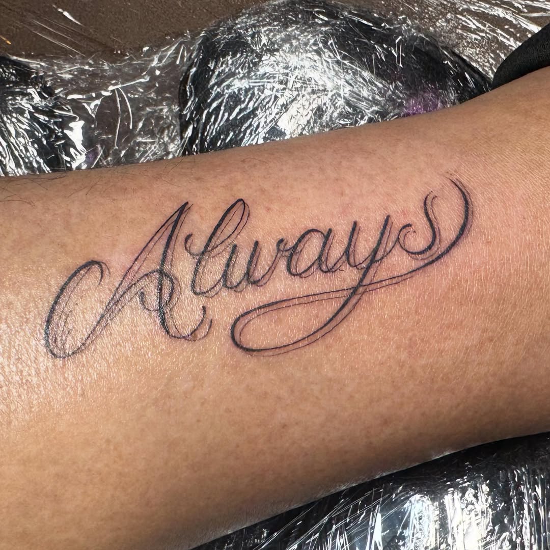 Tattoo by @justina.tattoos — lettering_script, fine_line