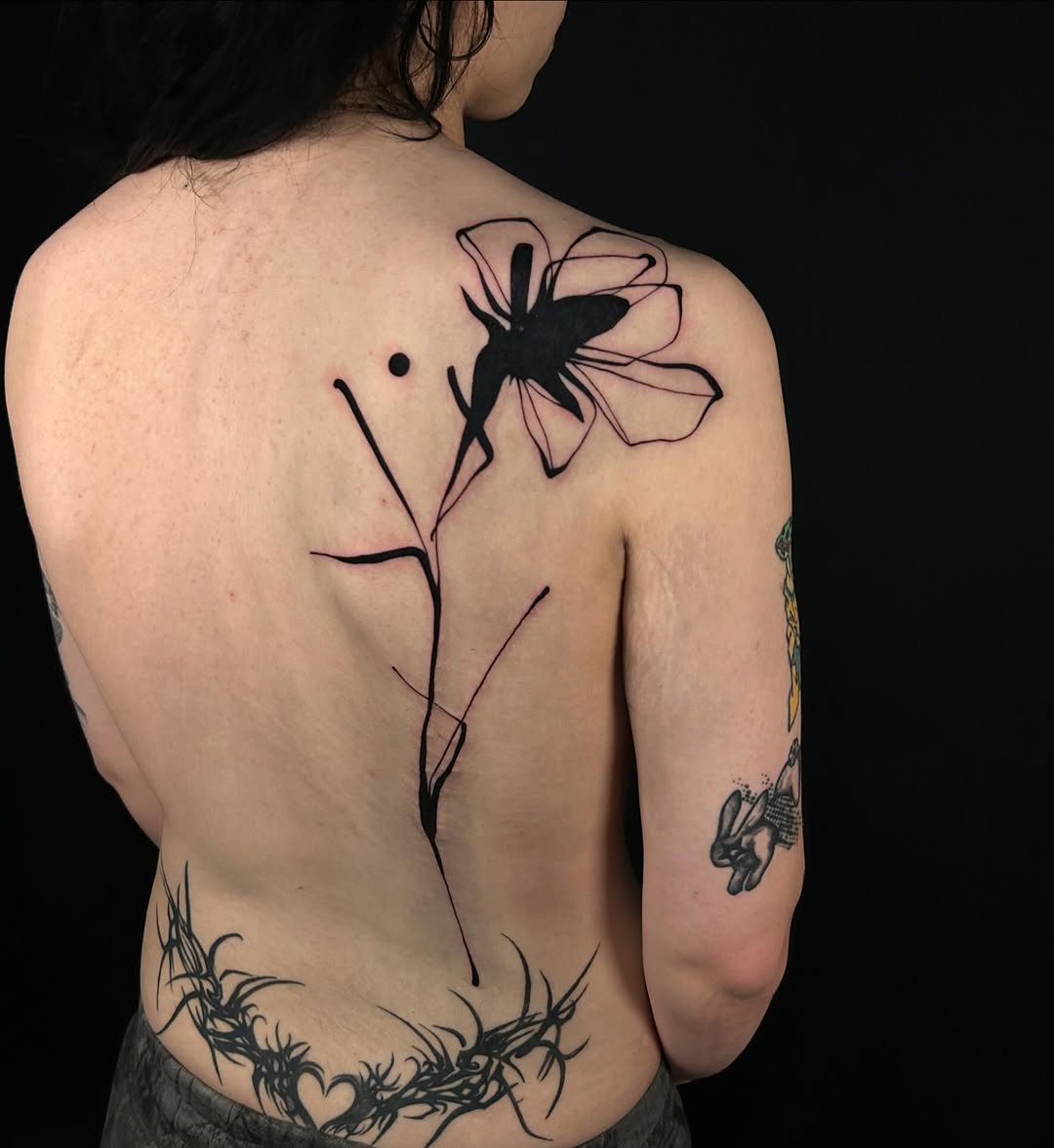 Tattoo by @laurabochet_tattoo — blackwork