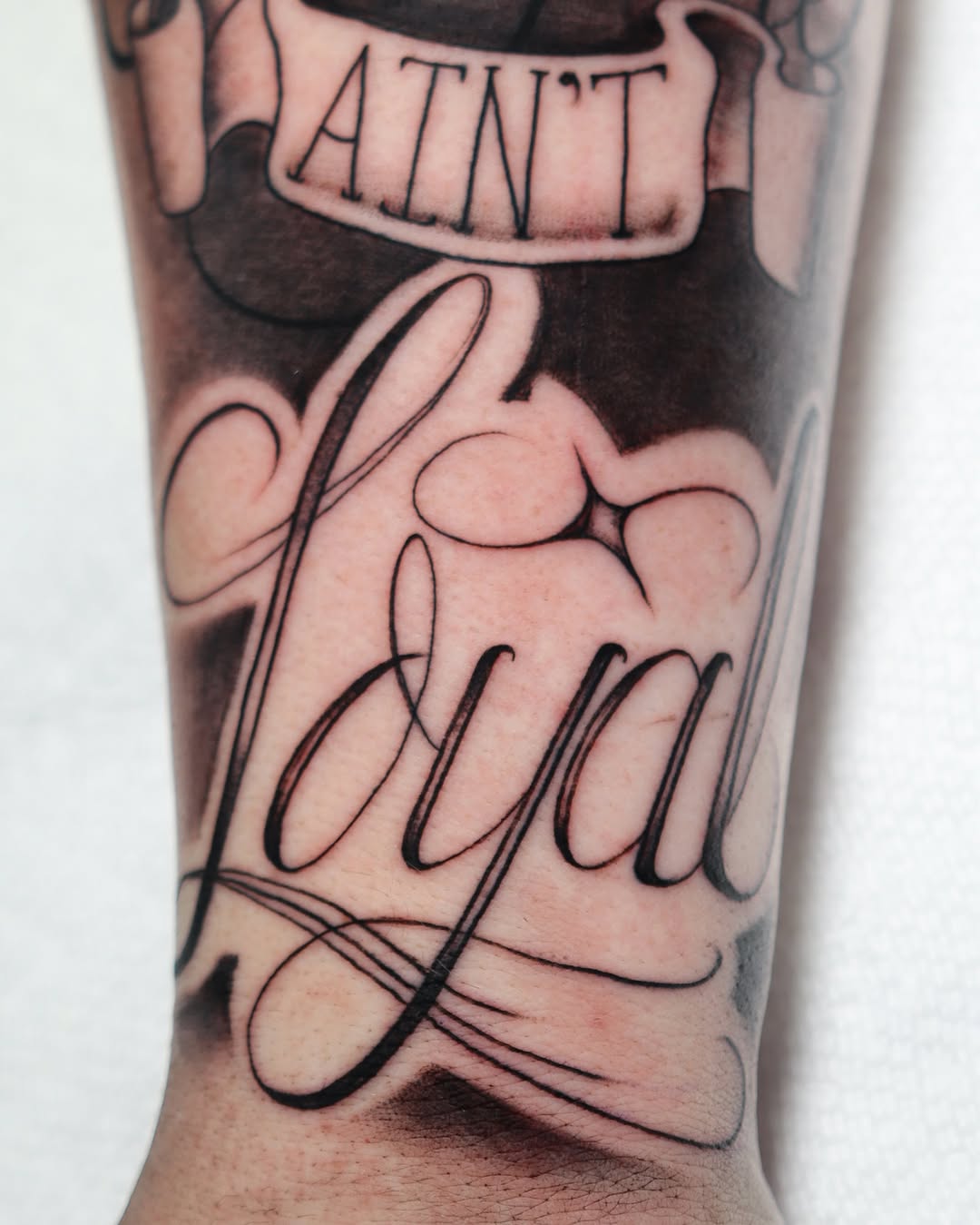 Tattoo by @cordero.inks — lettering_script, chicano