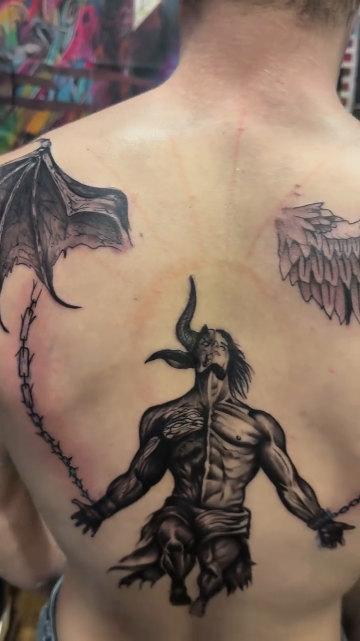 Tattoo by @scottys_ink315 — dark_realism, black_and_grey