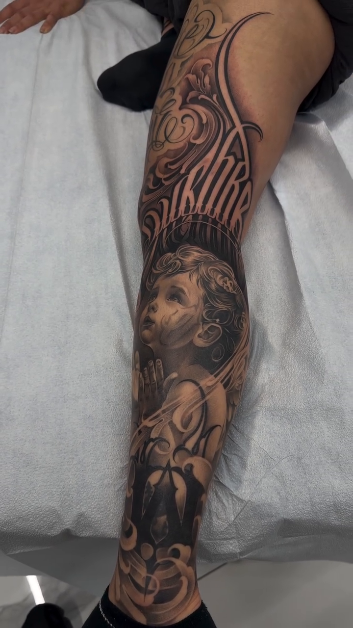 Tattoo by @angelstat2 — black_and_grey, realism