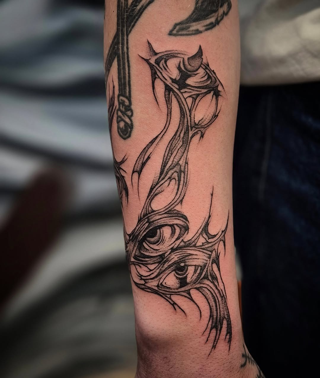Tattoo by @tattoo_ks_anastasiia — illustrative, blackwork