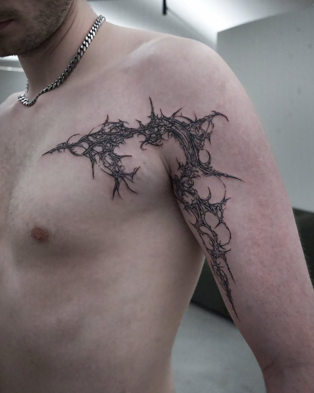 Tattoo by @gun_tattooist — blackwork, geometric