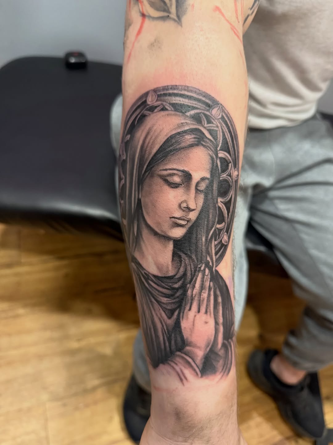 Tattoo by @scottys_ink315 — realism, black_and_grey