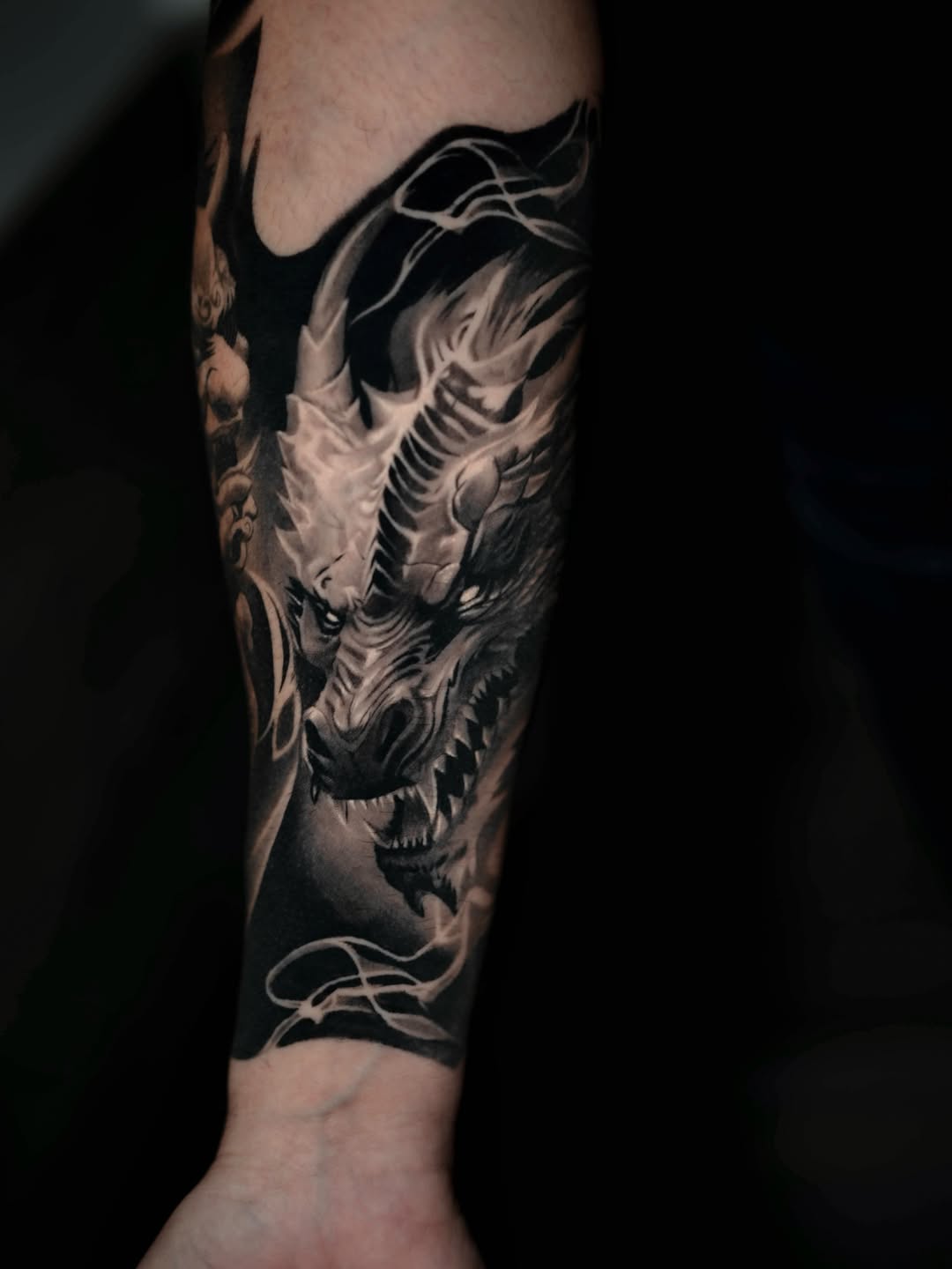 Tattoo by @nebesnuy_art — realism, black_and_grey