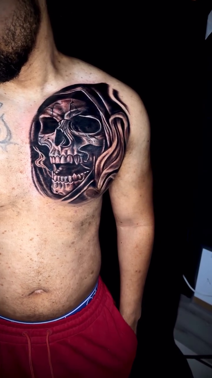 Tattoo by @imjusdifferent — dark_realism, black_and_grey