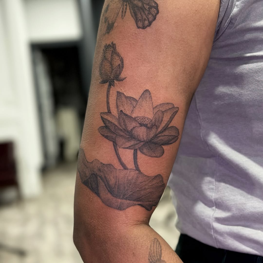Tattoo by @khk.ttt — black_and_grey, dotwork