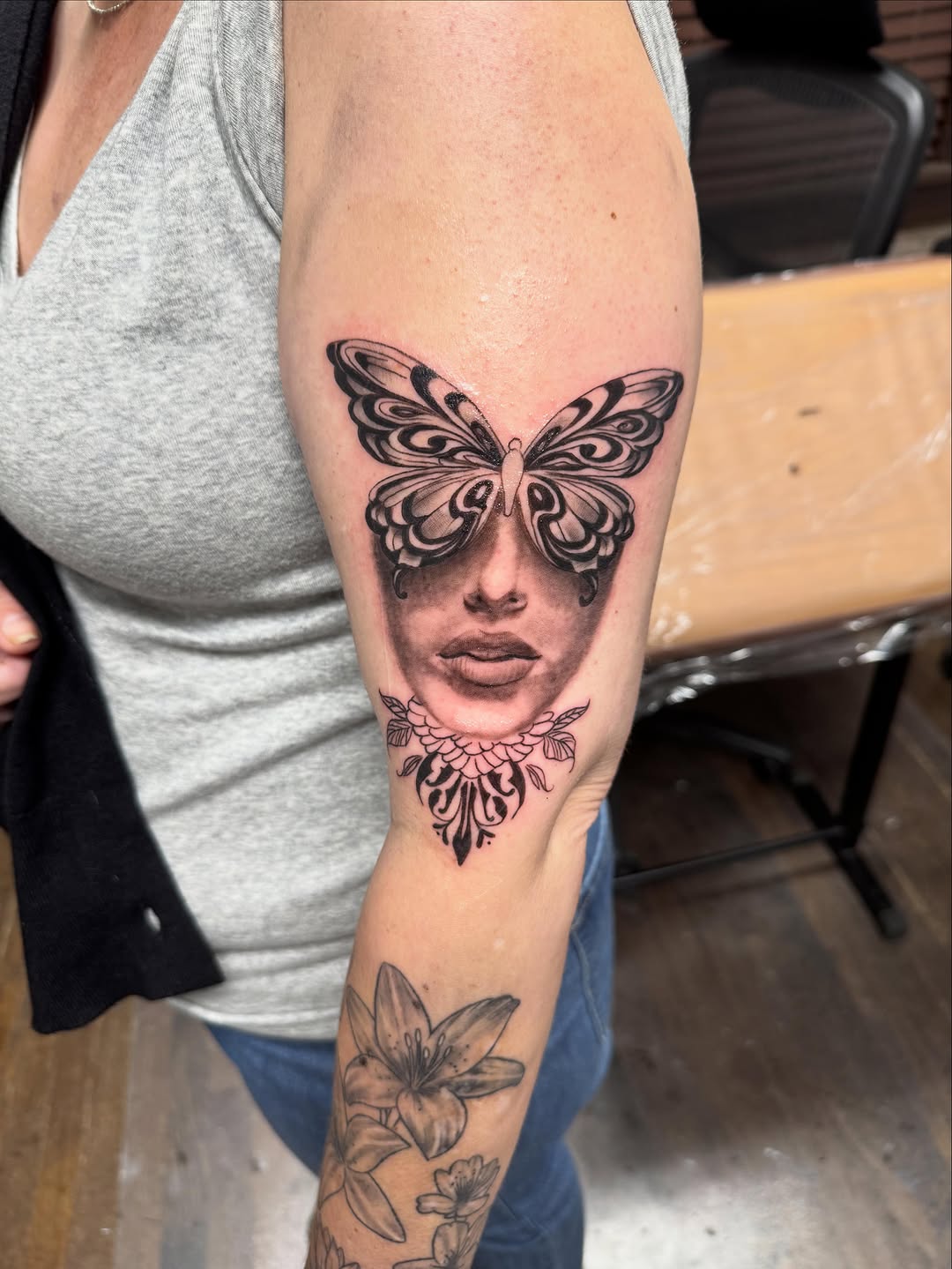 Tattoo by @lil_barbs — realism, black_and_grey