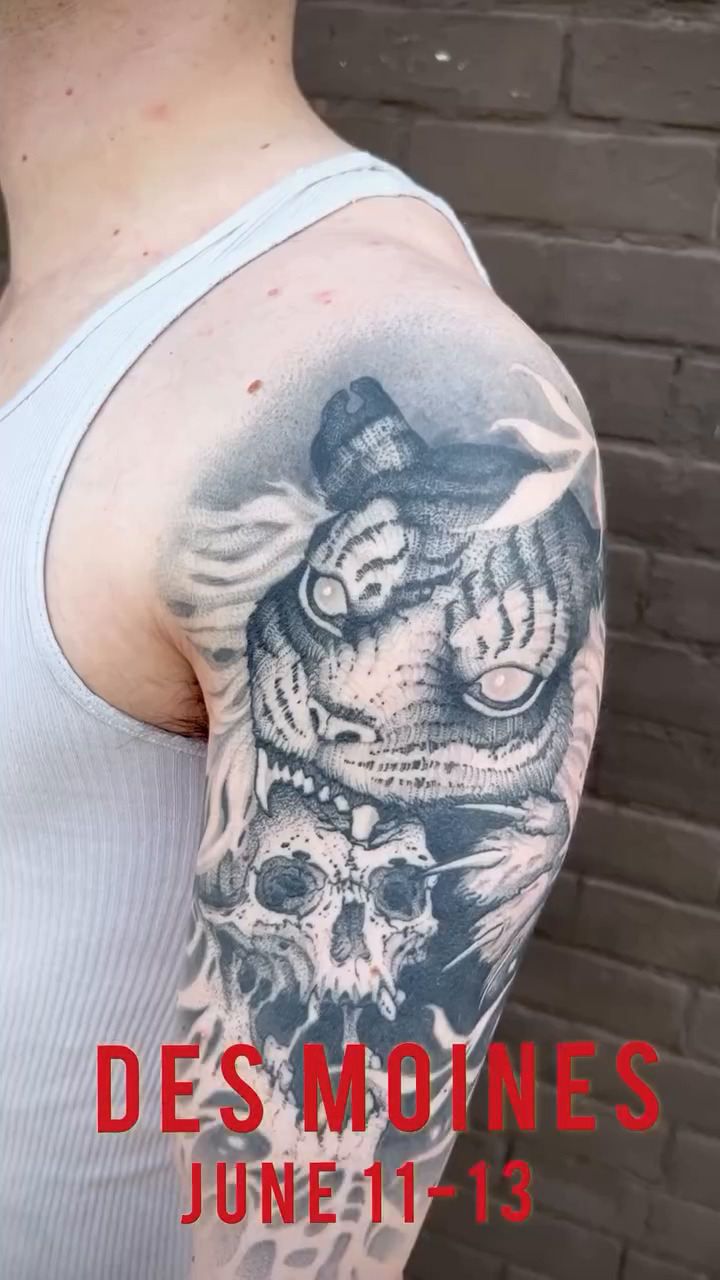 Tattoo by @trogdor_tattoo — black_and_grey, realism
