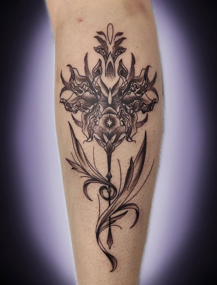 Tattoo by @julies.tattoos — blackwork, illustrative