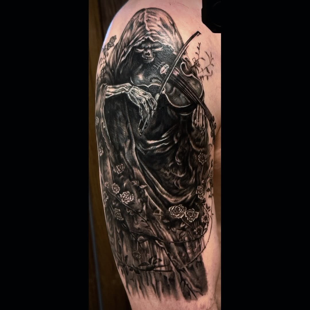 Tattoo by @jaz.ravenink โ realism, dark_realism
